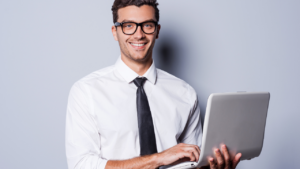 A man typing up an expert letter
