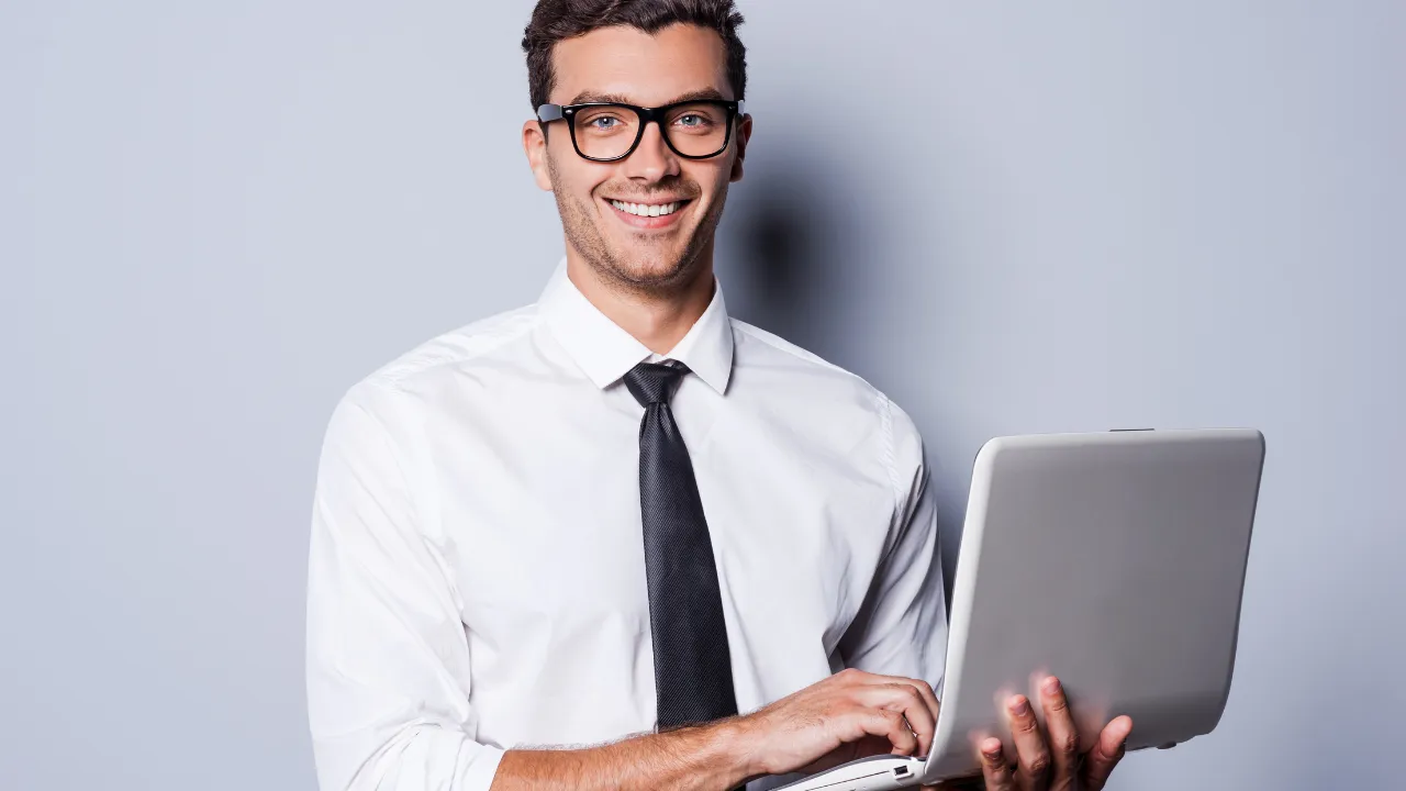 A man typing up an expert letter