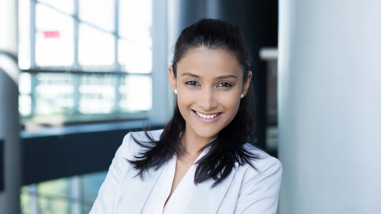 a professional smiling at the camera