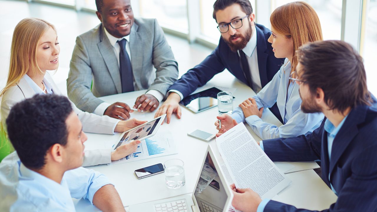 A group of employees in a meeting