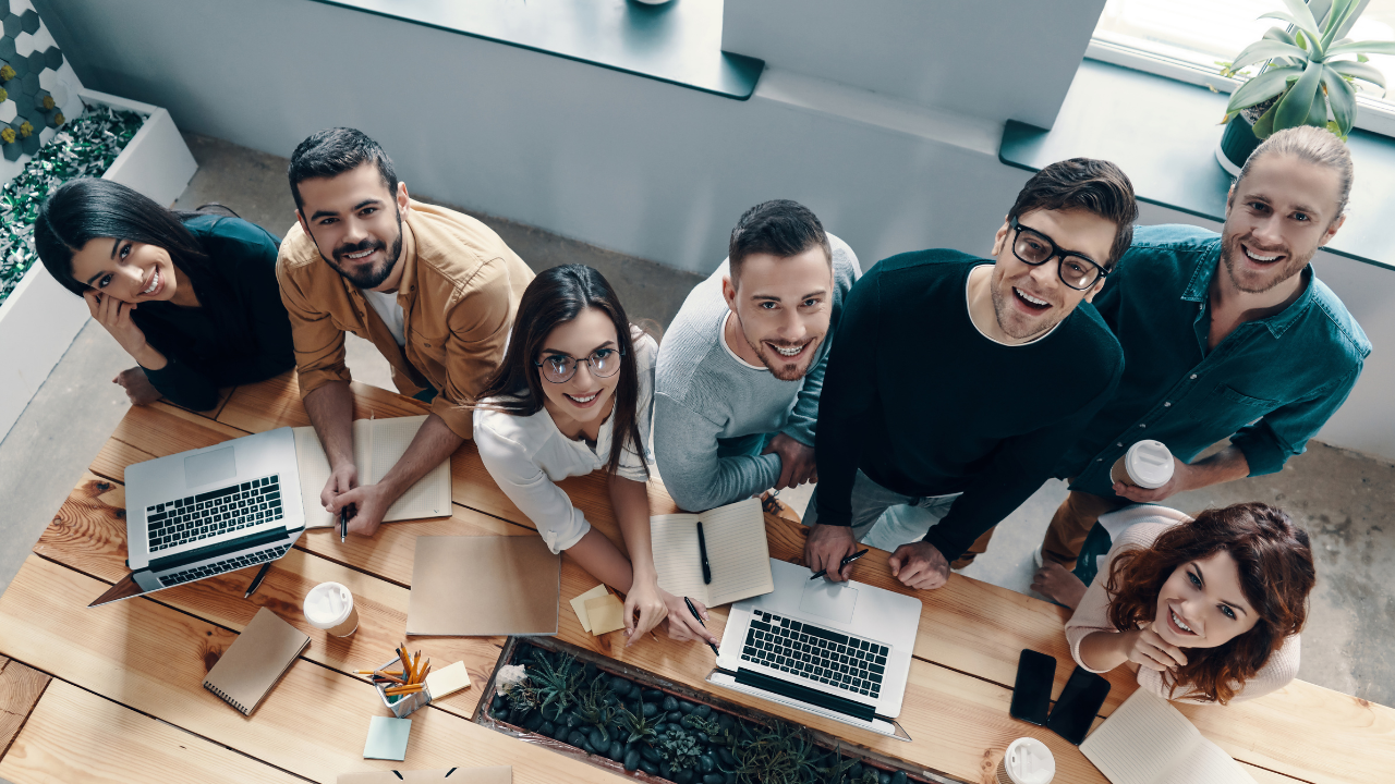 A business team in a meeting at a long desk