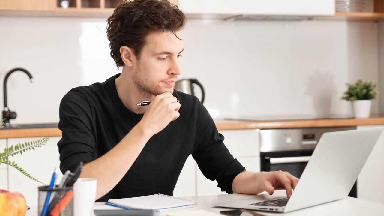 A man working remotely on his laptop