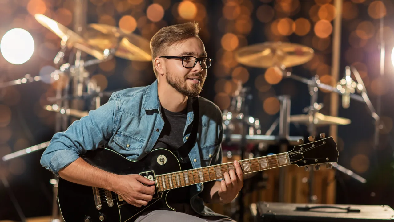 A musician playing guitar