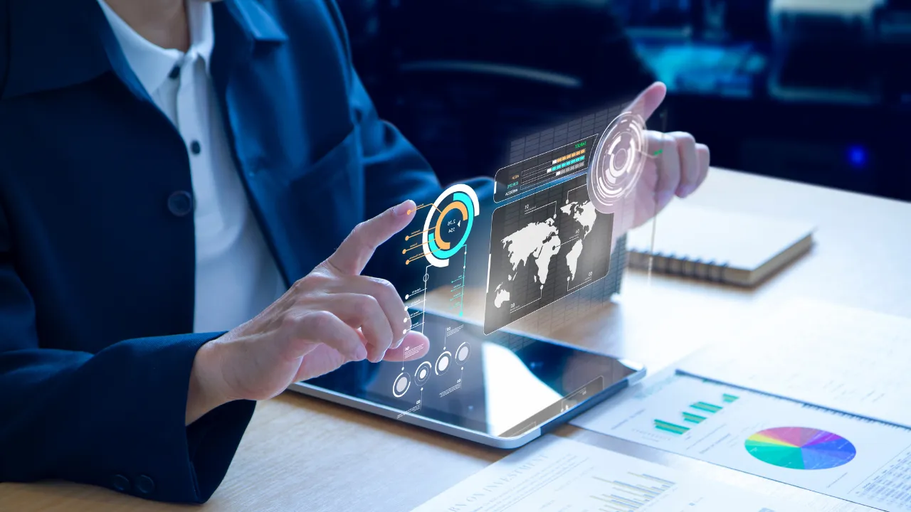 A professional looking at her investments on a tablet