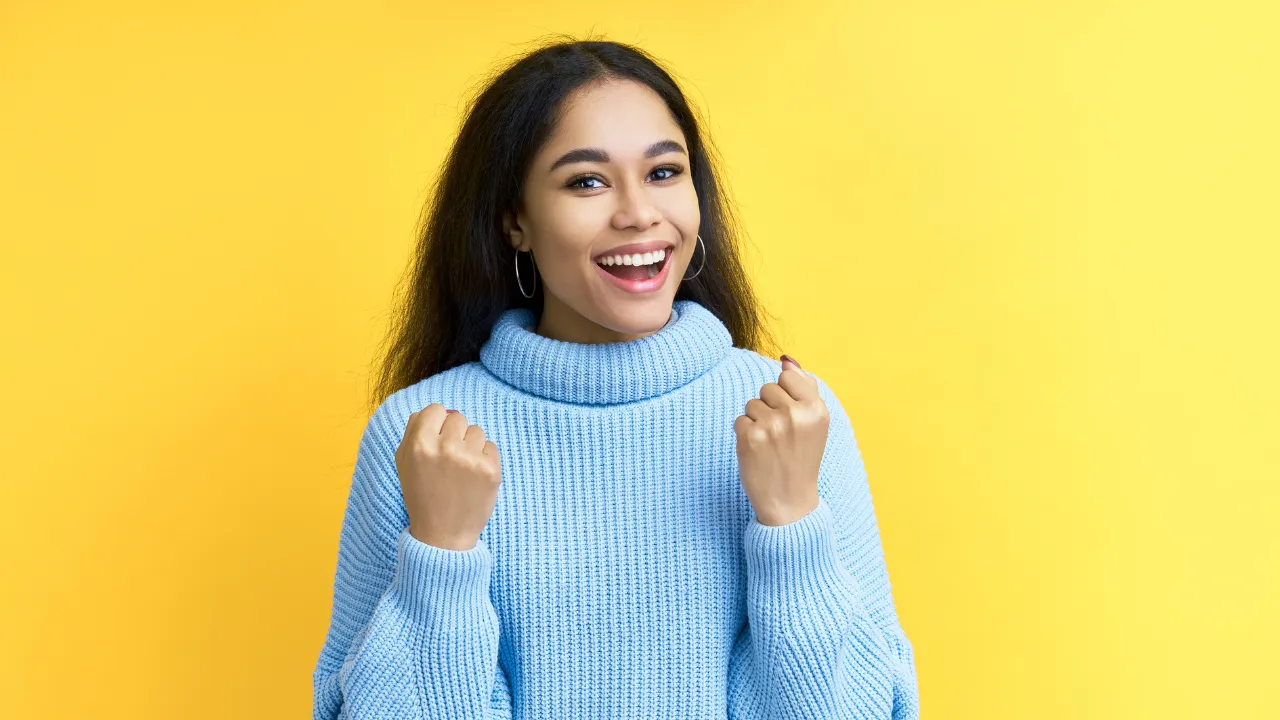 A woman celebrating a win