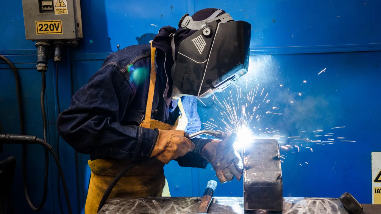A welding specialist at work welding