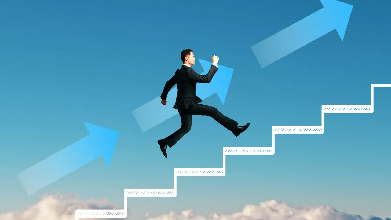 A business professional climbing the corporate latter