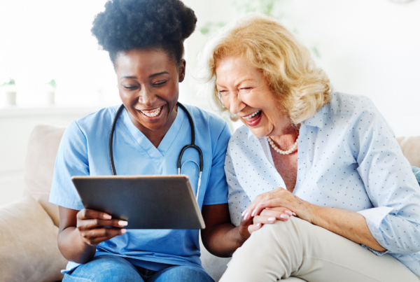 elderly care worker with a patient | Scott Legal, P.C. elderly care worker with a patient