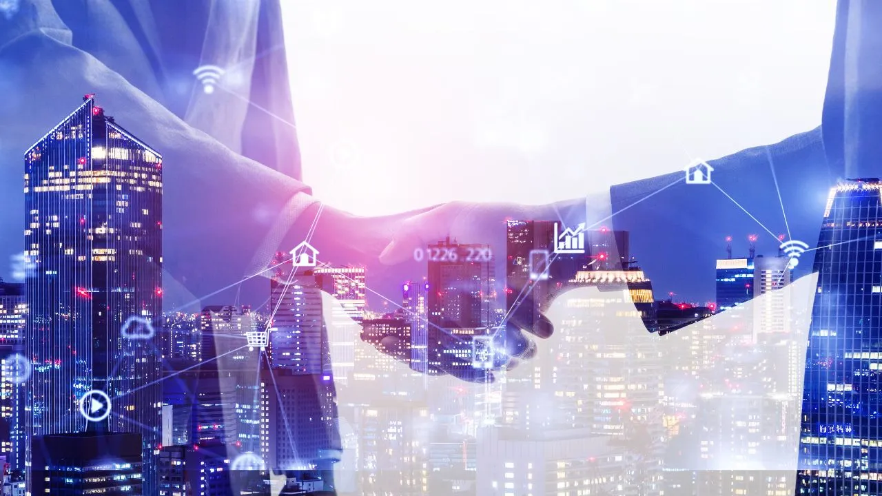 Business partners shaking hands