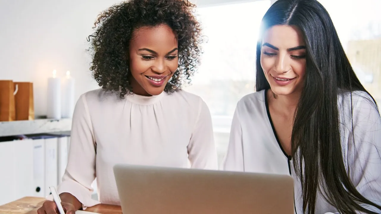 Two employees working at their new employment