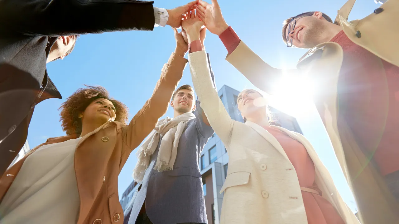 A group of people celebrating a win