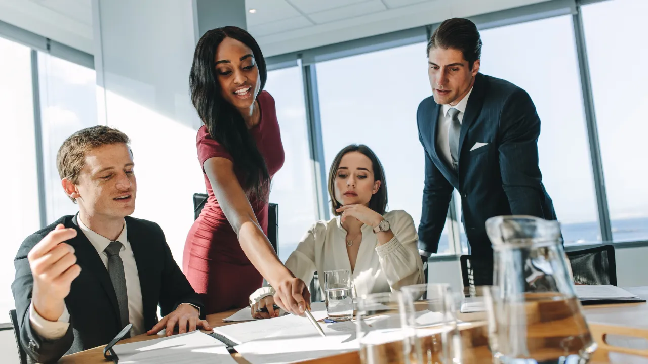 A team of skilled professionals gathered around a table