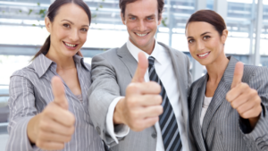 three people thumbs up