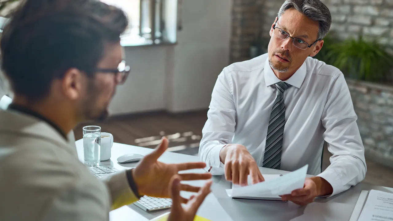 experienced workers speaking to each other
