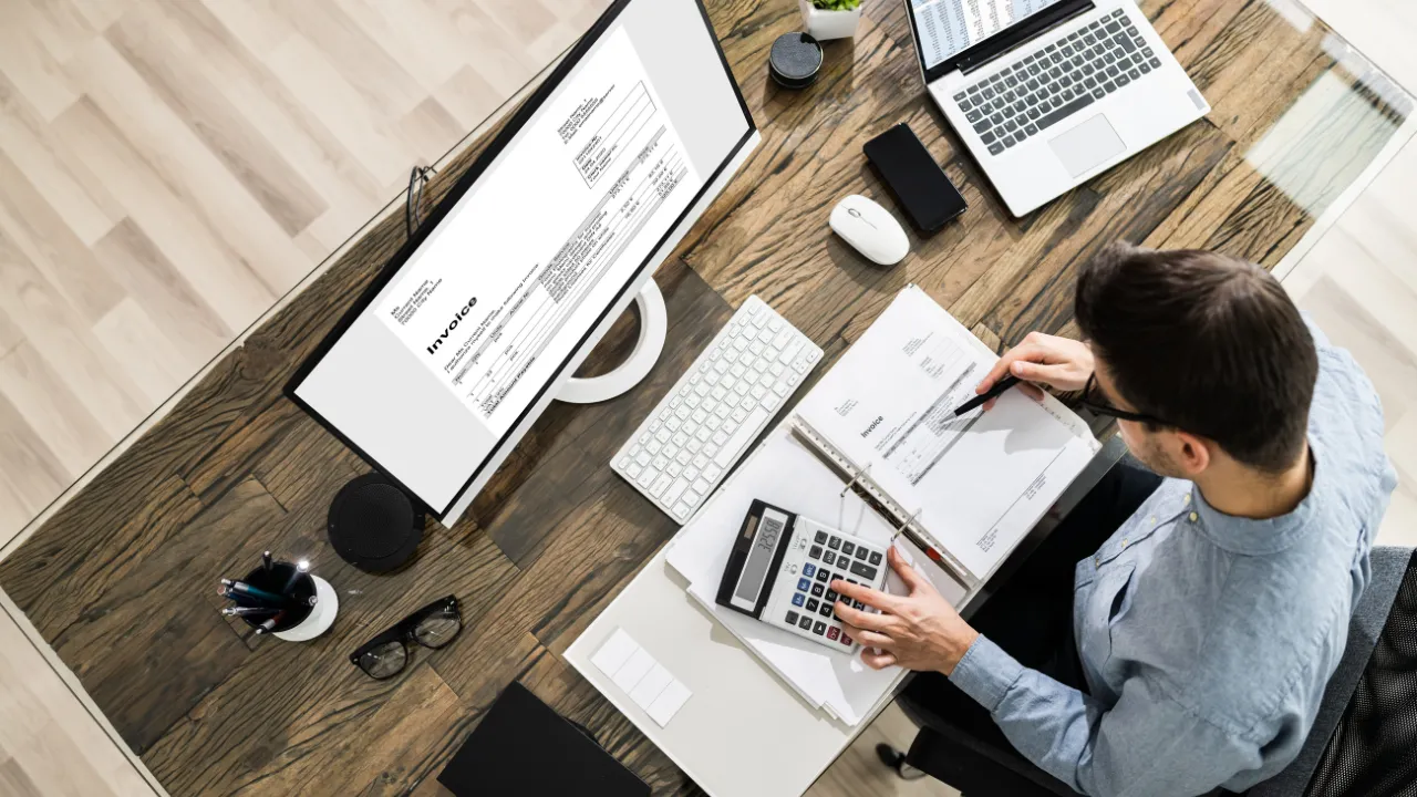 An accountant at work at his desk