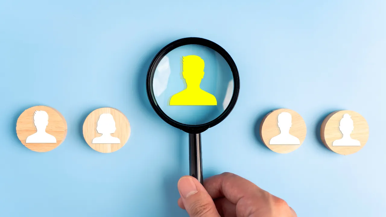 Employees under a magnified glass