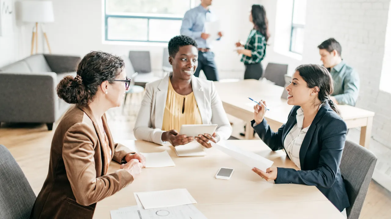 A group of business associates gathered for a meeting