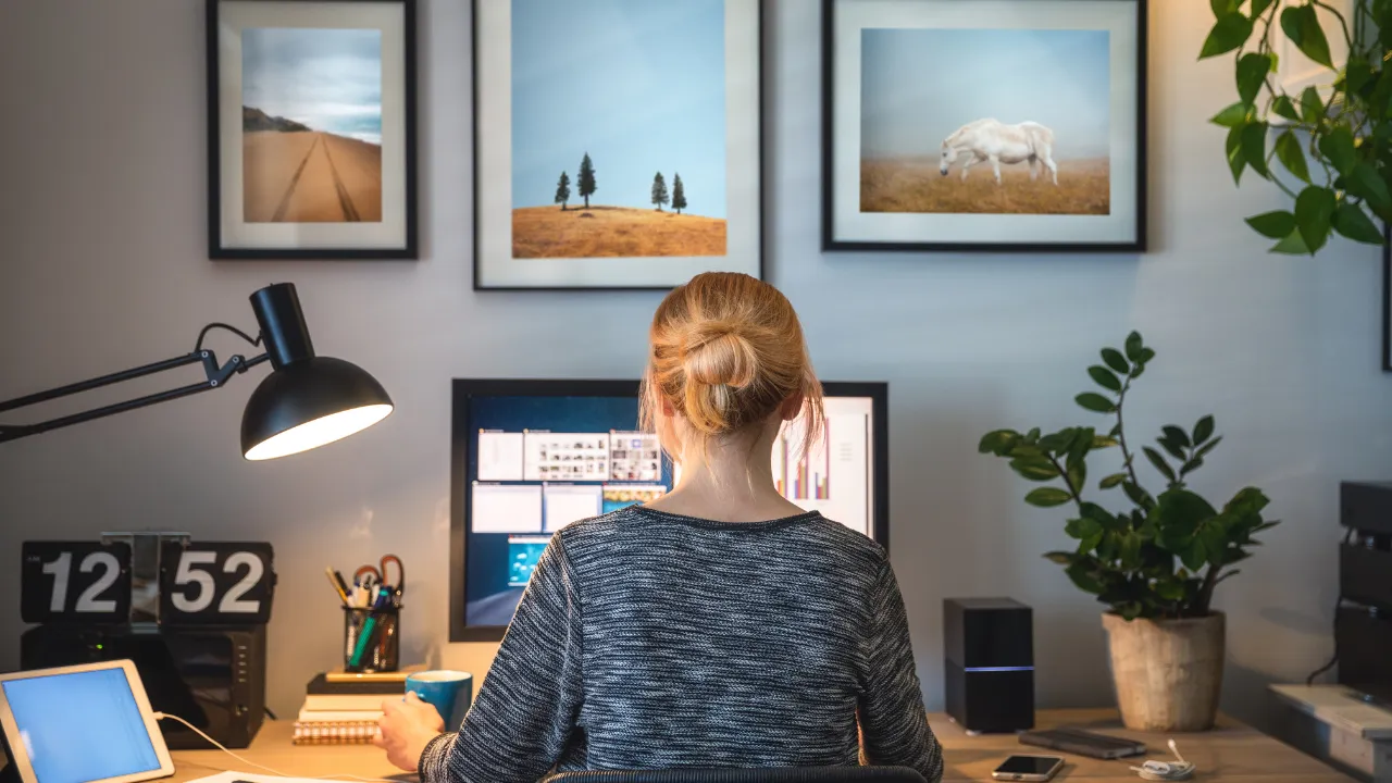 A woman working from home on her computer