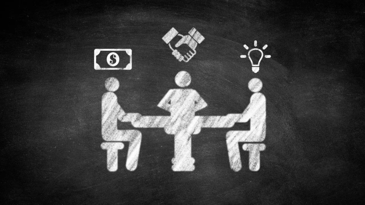 investors sitting around a table