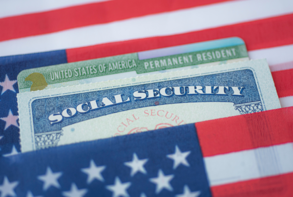 Green Card and US flag | Scott Legal, P.C. Green Card and US flag