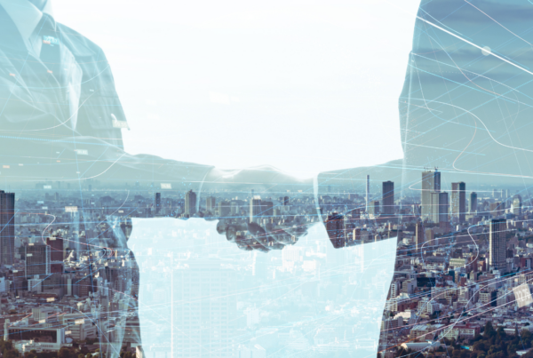 Business individuals shaking hands