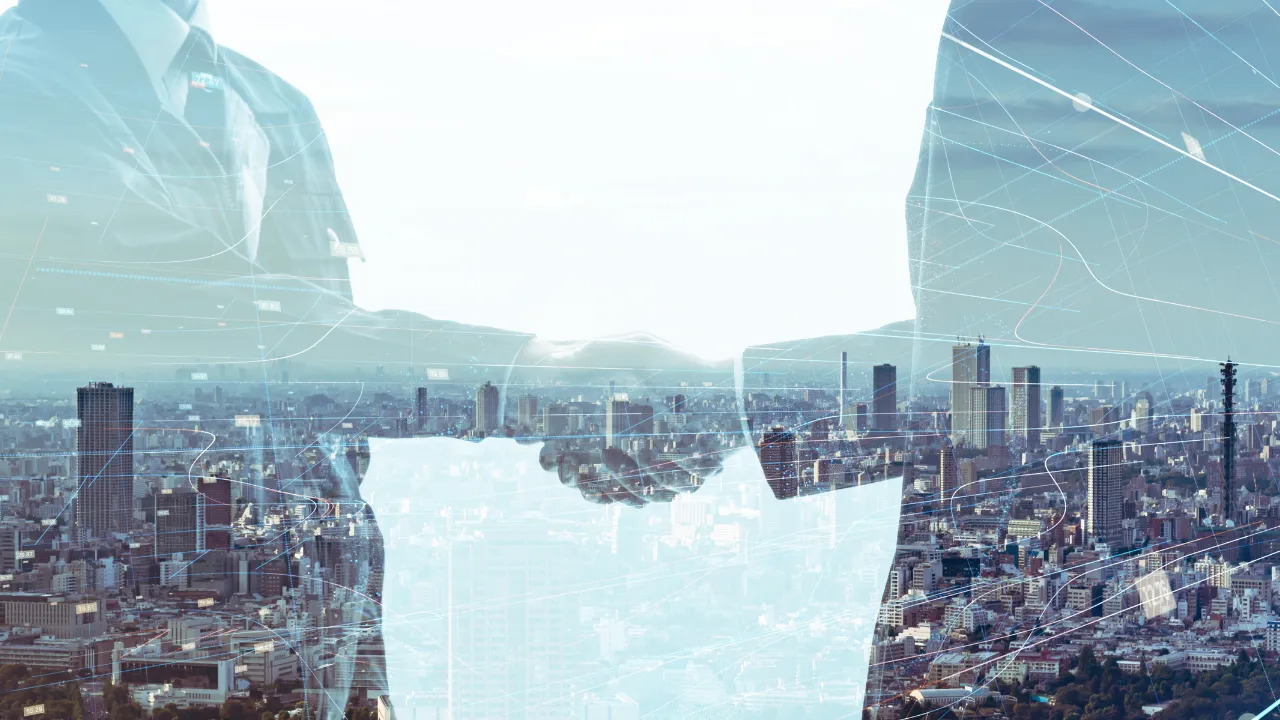 Business individuals shaking hands