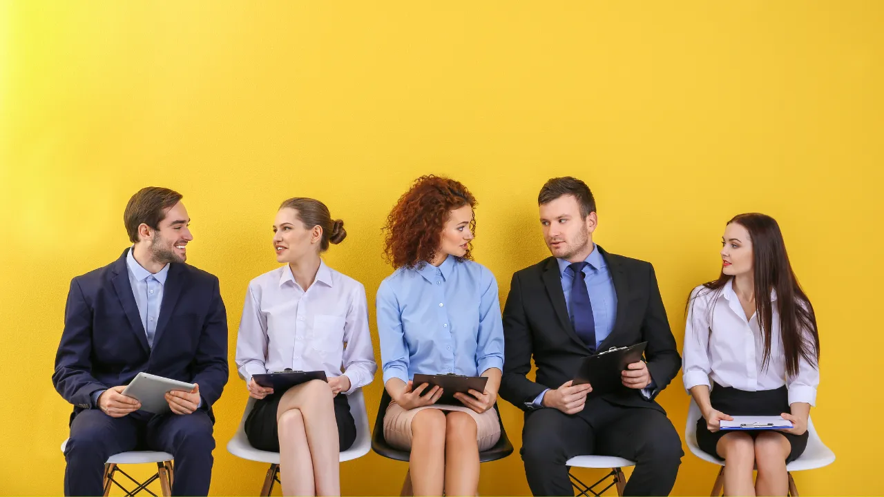 A group of individuals waiting to be interviewed for a job position