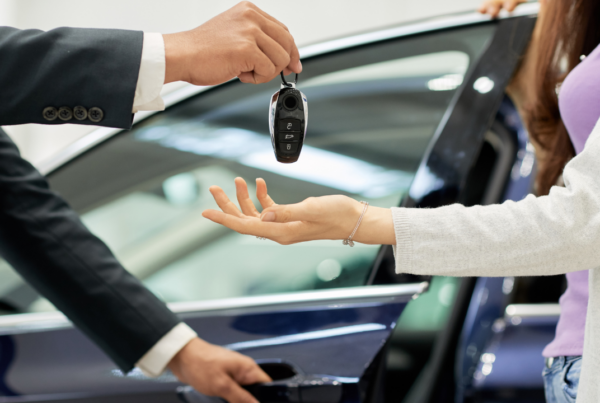 A car being bought at a car dealership | Scott Legal, P.C. A car being bought at a car dealership
