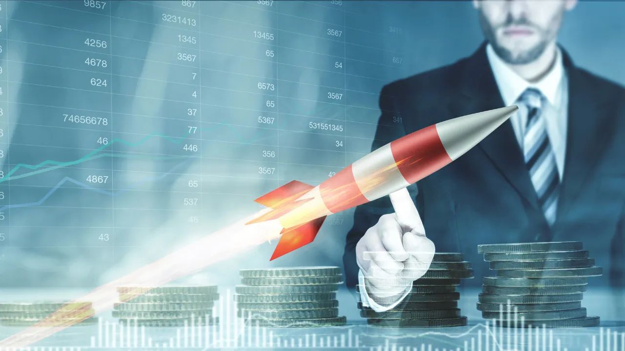 An entrepreneur charting his financial success