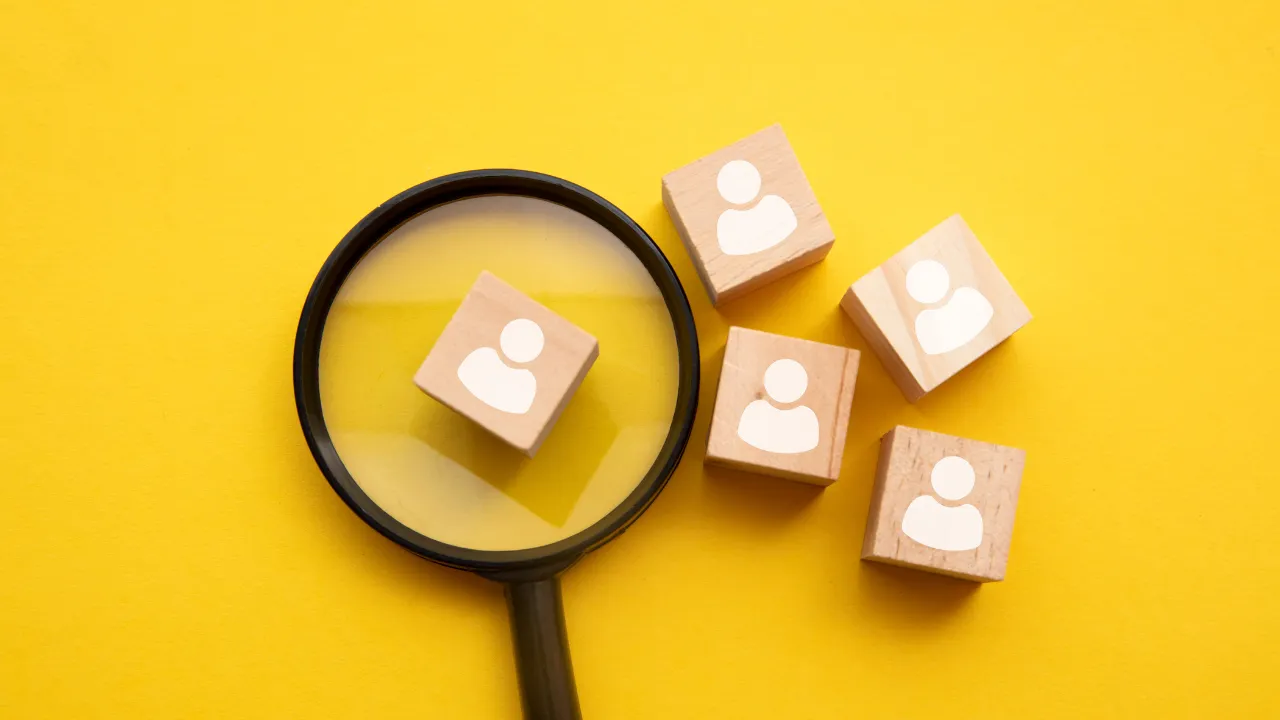 Employer building blocks under a magnified glass