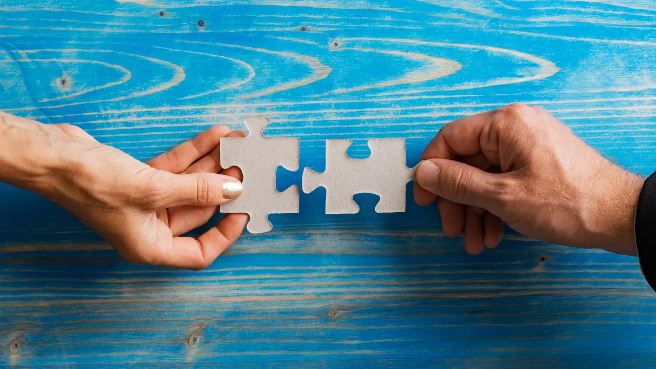 Two connecting puzzle pieces