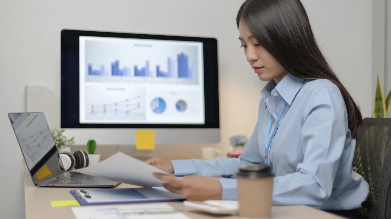 A business woman doing work at her desk