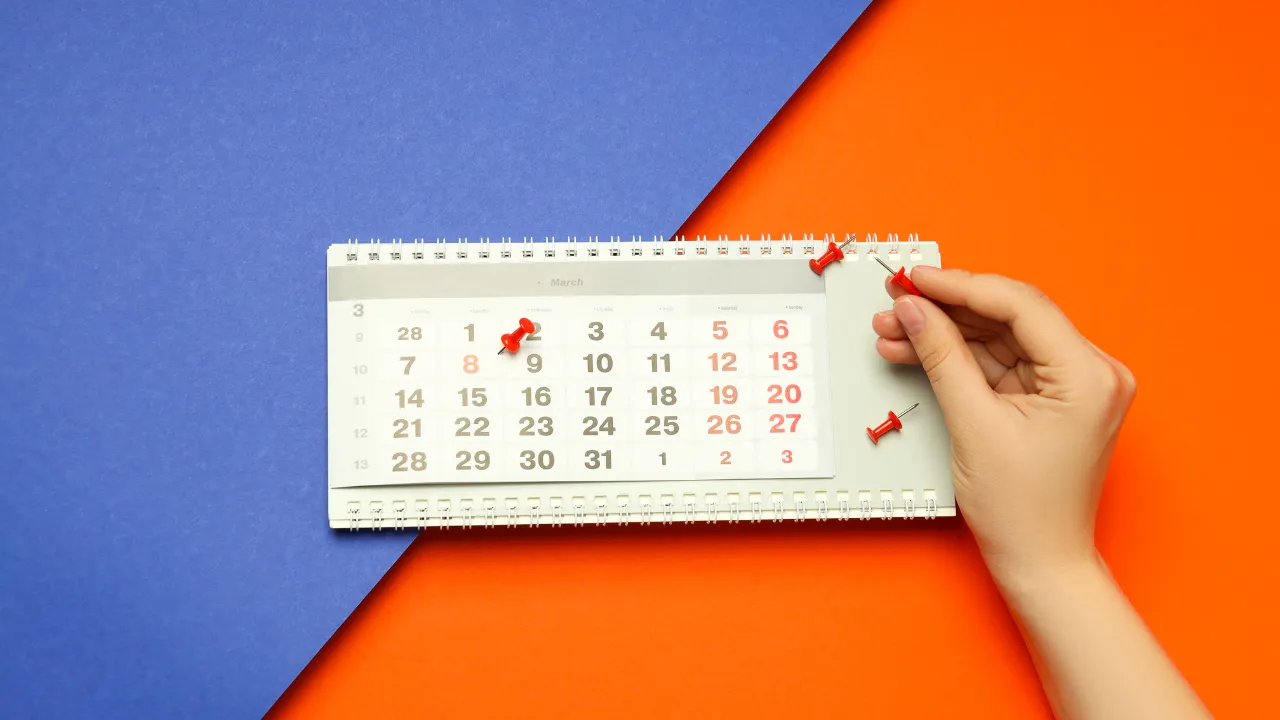 A calendar with points pinned
