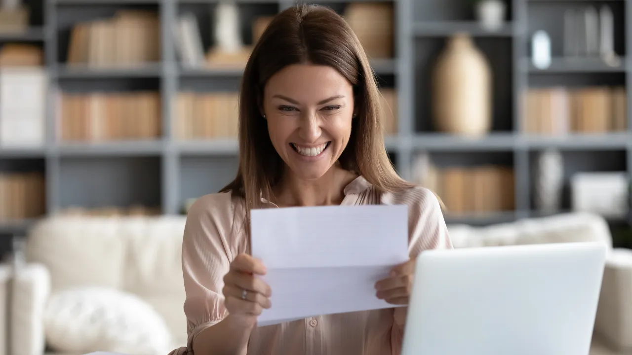 A woman celebrating a win