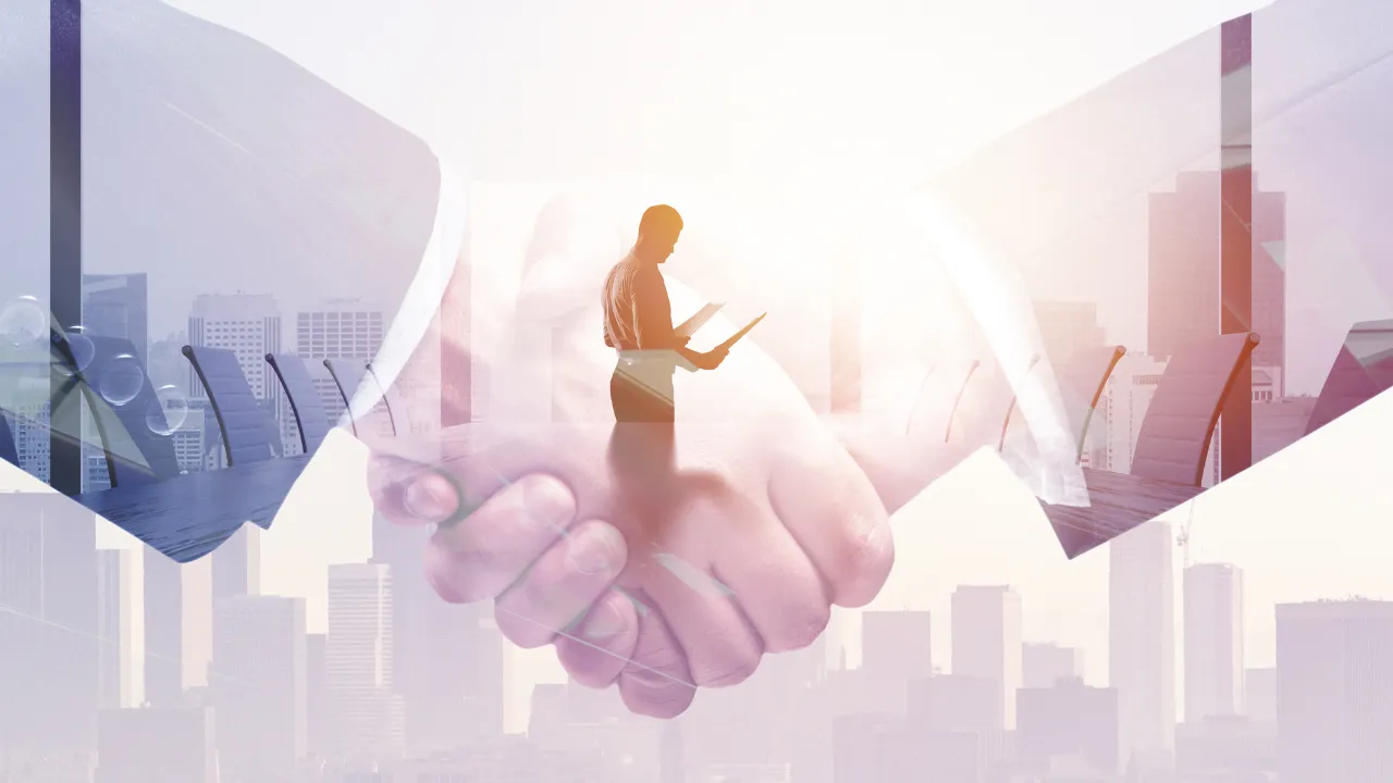 A business agreement displayed as two hands shaking in agreement