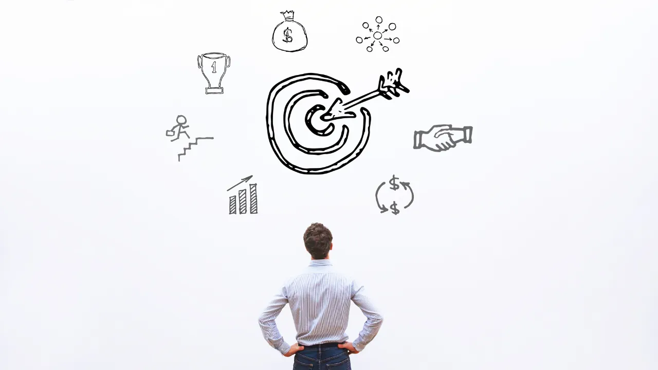 A business man considering his business goals