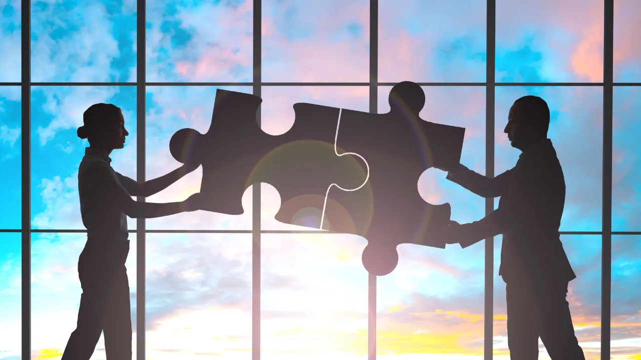 Partners depicted as puzzle pieces fit together