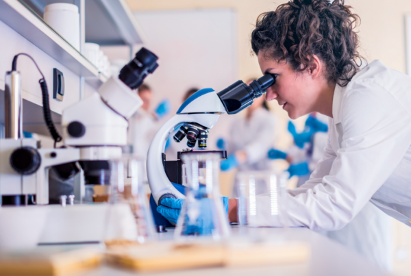 Scientist looking in a microscope