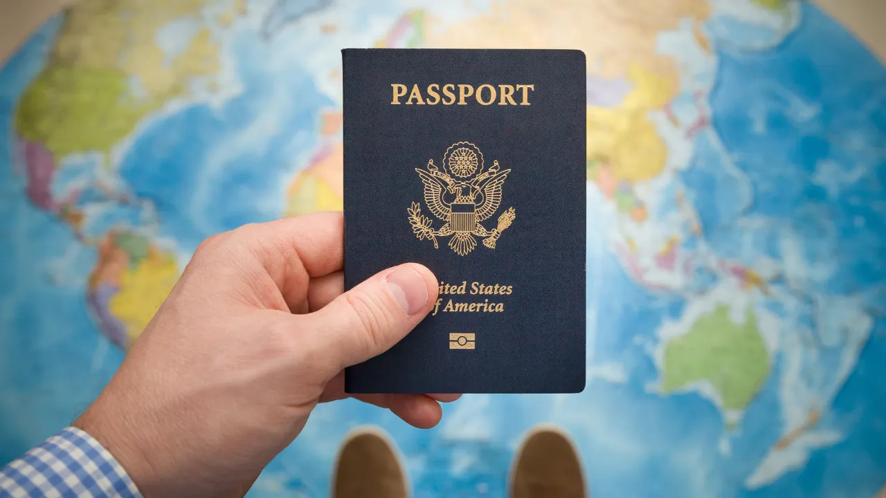 A man holding a passport