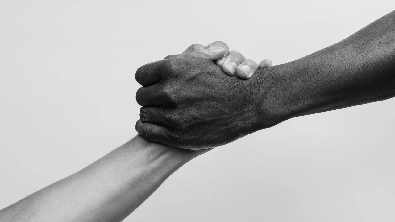 Hands linked in solidarity