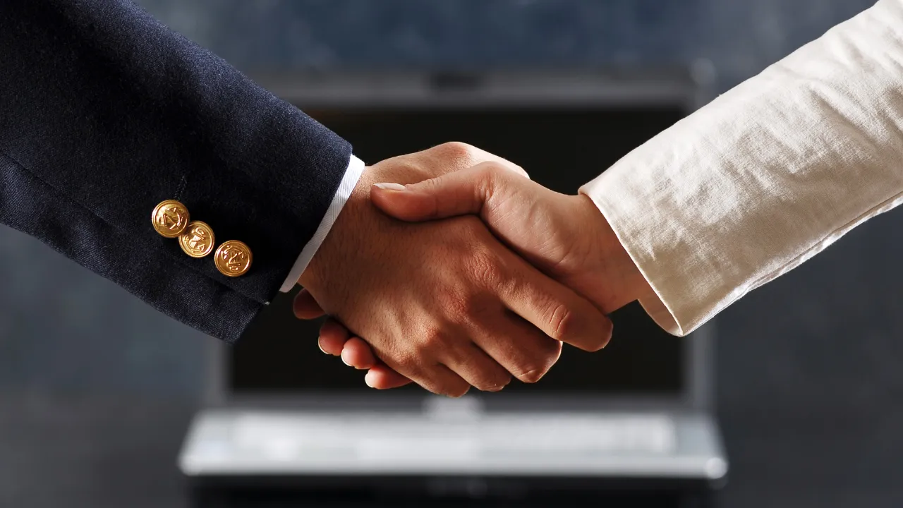 Partners shaking hands