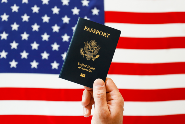 A US flag and passport | Scott Legal, P.C. A US flag and passport