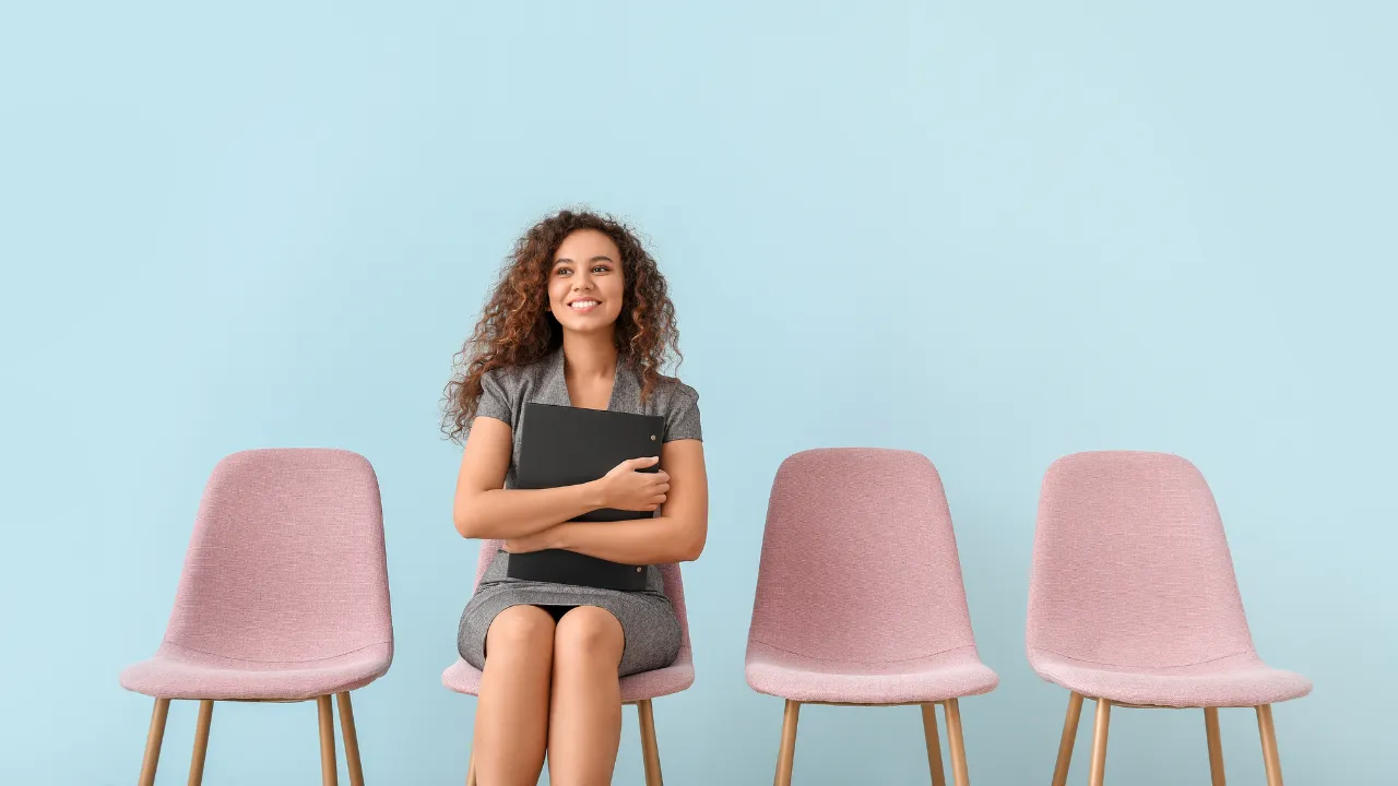 A woman waiting to be interviewed for a job