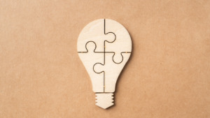 Insight conveyed as a puzzle light bulb