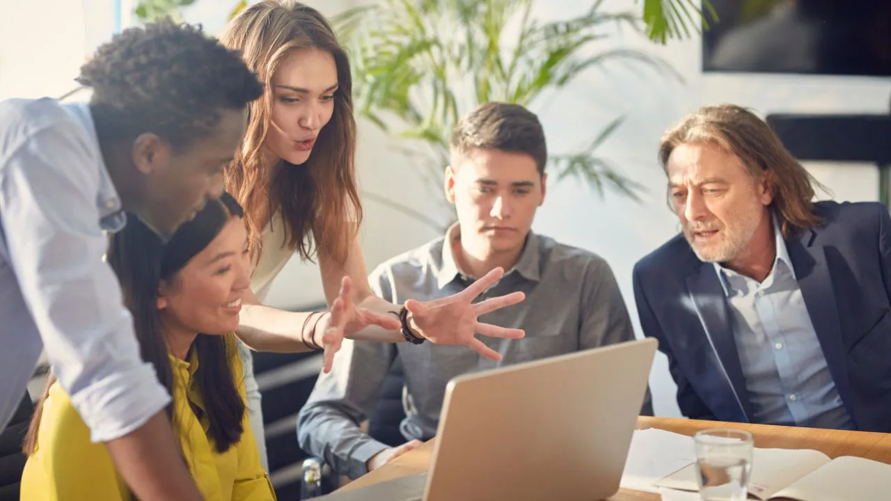 A teacher and mentor with a group of students