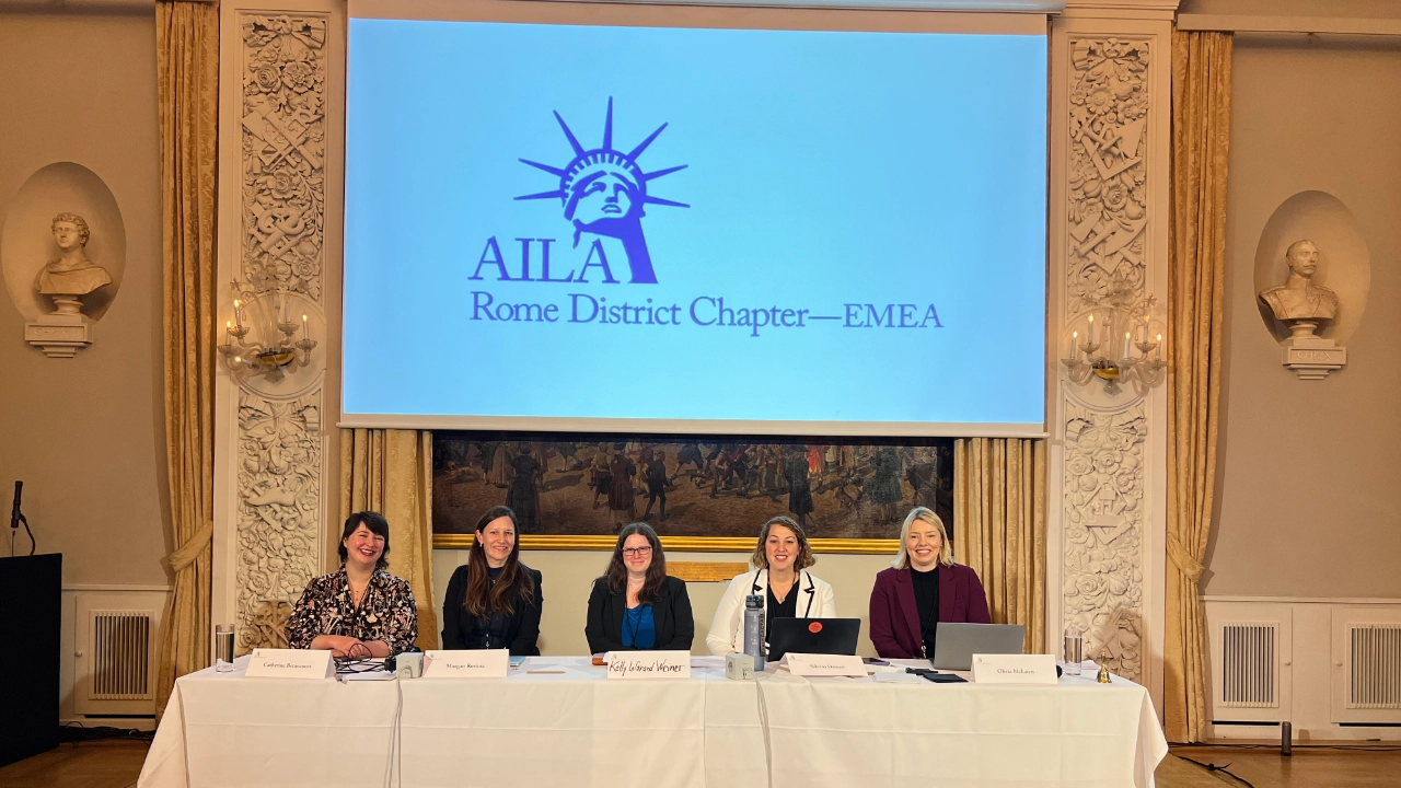Panel of five female immigration attorneys, including Kelly Weiner, speaking at the AILA Rome District Chapter - EMEA conference in Copenhagen.
