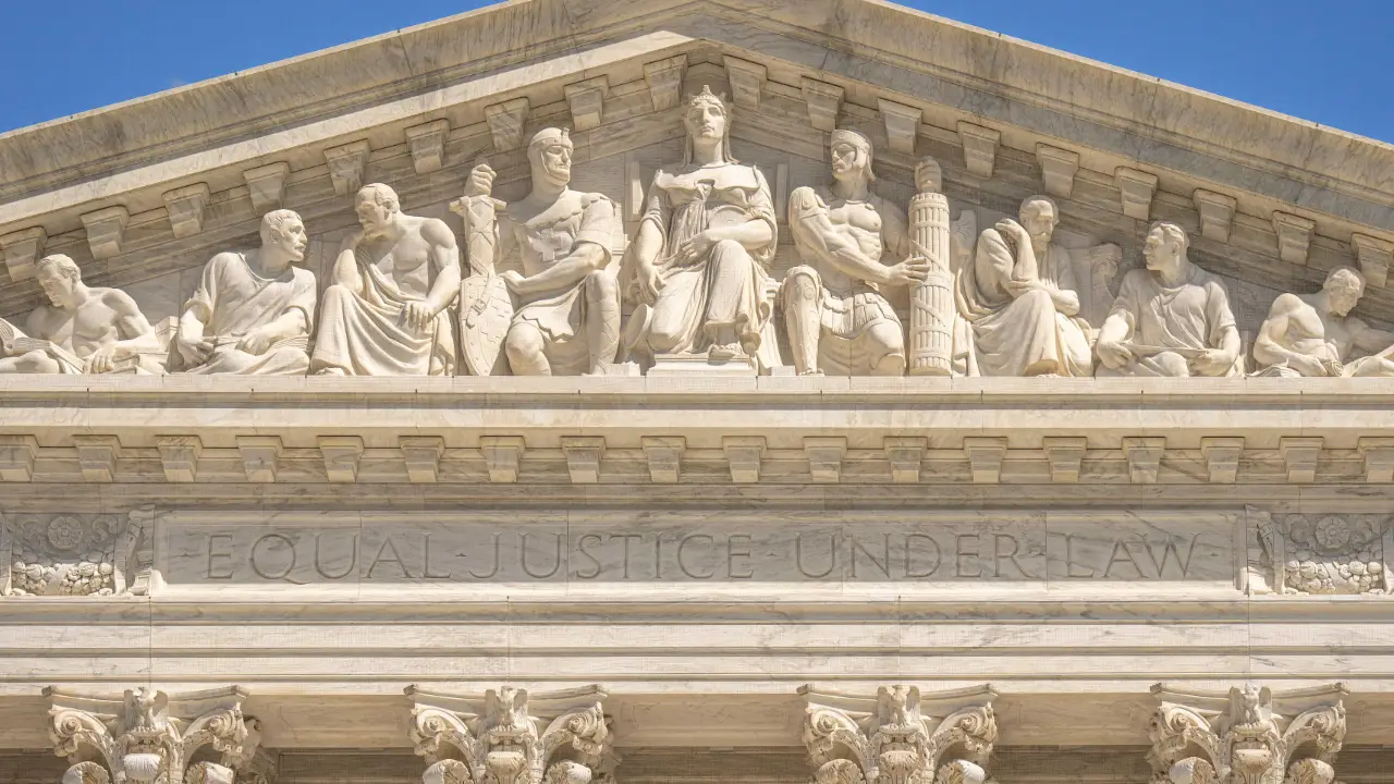 West pediment of the U.S. Supreme Court building with the inscription Equal Justice Under Law beneath sculpted figures